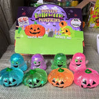 Solis Hollow — glitter ghost and pumpkin squishies in front of their display box