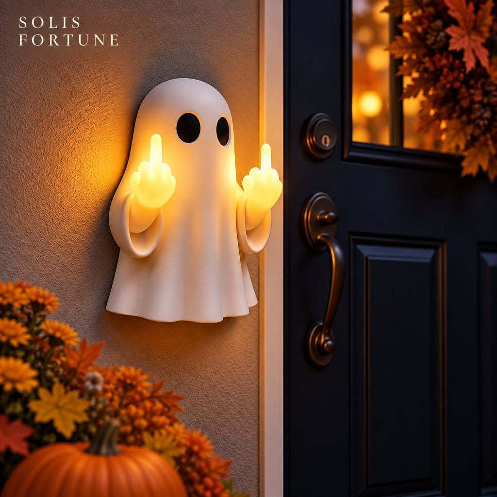 Solis Hollow Rude Ghost Night Light glowing beside a front door with pumpkins