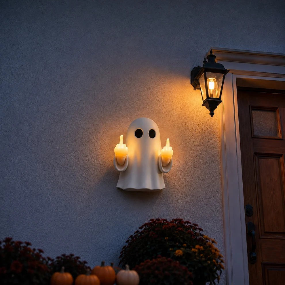 Solis Hollow Rude Ghost Night Light glowing under a porch lantern at night
