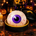 Solis Hollow — Bloodshot Eyeball squishy bun, 5.5 cm, in its mini steamer