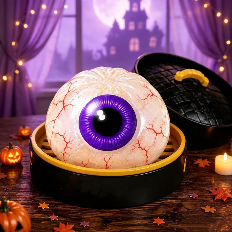 Solis Hollow — Bloodshot Eyeball squishy bun, 6.5 cm, in its mini steamer
