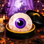 Solis Hollow — Bloodshot Eyeball squishy bun, 8.5 cm, in its mini steamer
