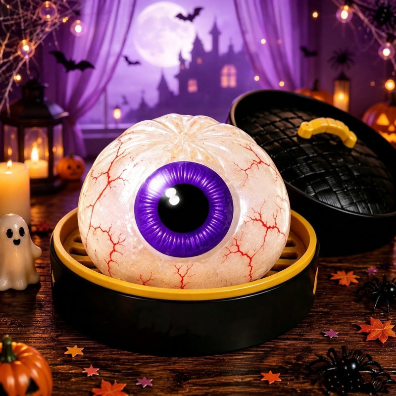 Solis Hollow — Bloodshot Eyeball squishy bun, 8.5 cm, in its mini steamer