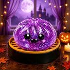 Solis Hollow — Purple Monster squishy bun, 6.5 cm, in its mini steamer