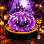 Solis Hollow — Purple Monster squishy bun, 8.5 cm, in its mini steamer