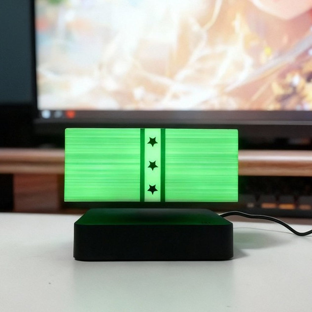 Solis Hoverstack — Square Base, Green Light: floating money lamp