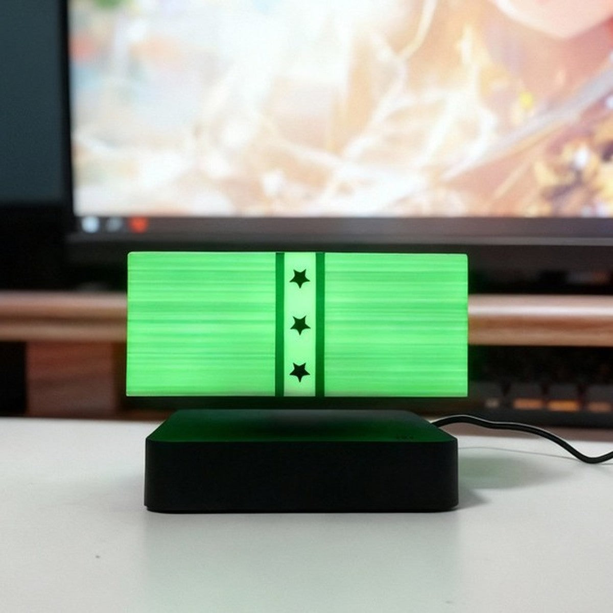 Solis Hoverstack — Square Base, Green Light: floating money lamp