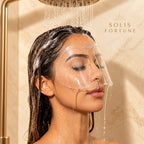 Solis Lash Guard — clear shower shield for lash extensions on the forehead, shower water running off