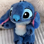 Solis Lullo — fluffy breathing Stitch plush lying on a soft blanket
