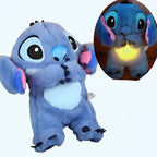 Solis Lullo — blue Stitch plush with its belly light on in the dark