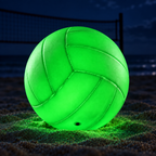 Glow-in-the-dark volleyball glowing bright green in a dark room