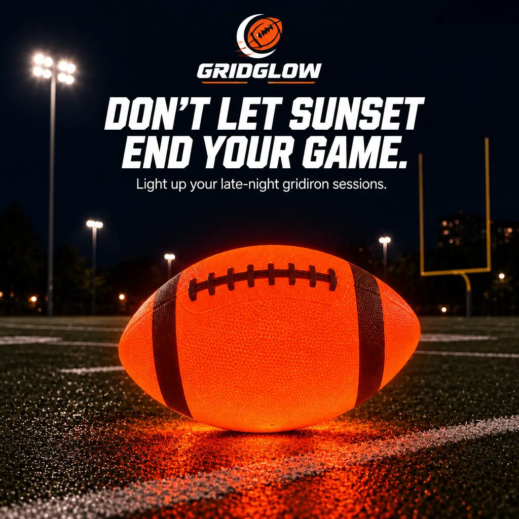 Light-up football glowing orange on a field at night