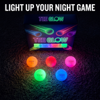 Glowing LED golf balls in orange, red, pink, green and blue in front of the box
