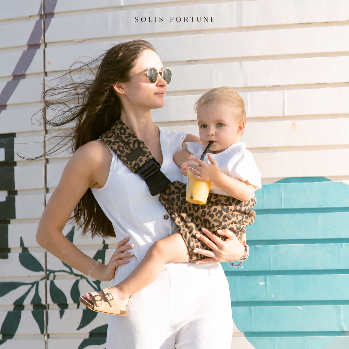 Solis Perch — toddler sitting securely on the hip seat