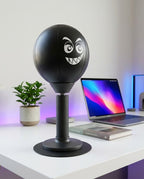 Solis Popjab — desk punching ball on a white desk next to a laptop