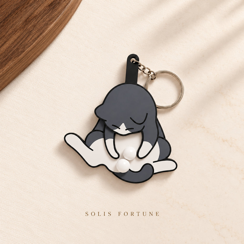 Solis Purrpop — Gray: dark gray and white cat stress ball keychain