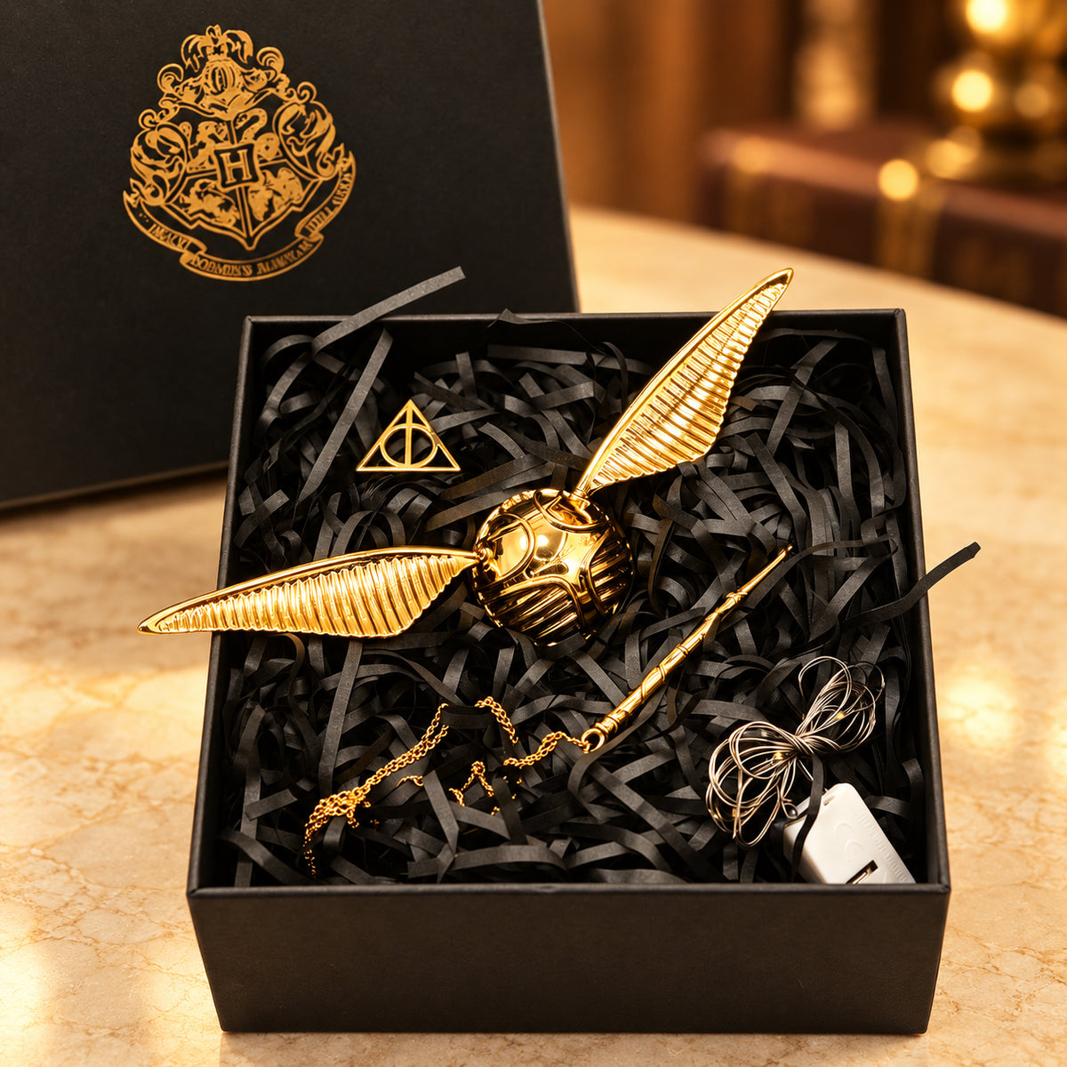 Solis Seeker — Golden Snitch ring box with fixed gold wings, wand key, necklace and LED light string in its gift box