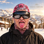 Solis Slope Faces — Curler Grandma: grandma face with pink hair curlers, sticking out her tongue, worn with ski goggles at a ski resort