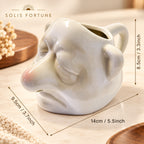 Solis Sniffles — ceramic nose egg separator, about 14 x 9.5 x 8.5 cm