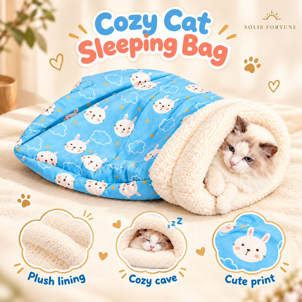 Solis Snoozle — cat sleeping bag with plush lining, blue bunny print, cat peeking out