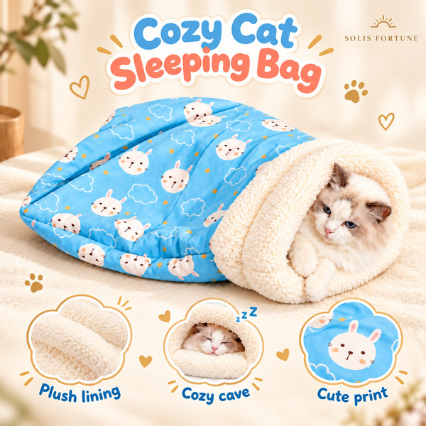 Solis Snoozle — cat sleeping bag with plush lining, blue bunny print, cat peeking out