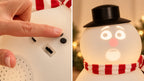 Solis Snow Chatter — talking snowman control buttons on the back and the animated face