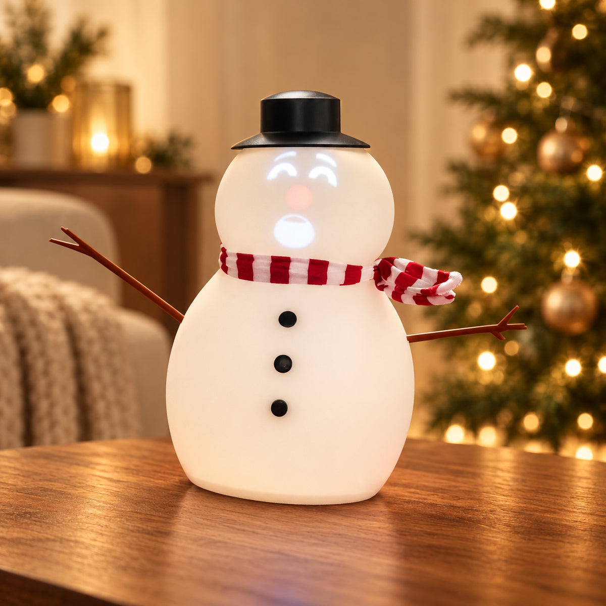 Solis Snow Chatter — animated snowman with projector pulling a funny face by the Christmas tree