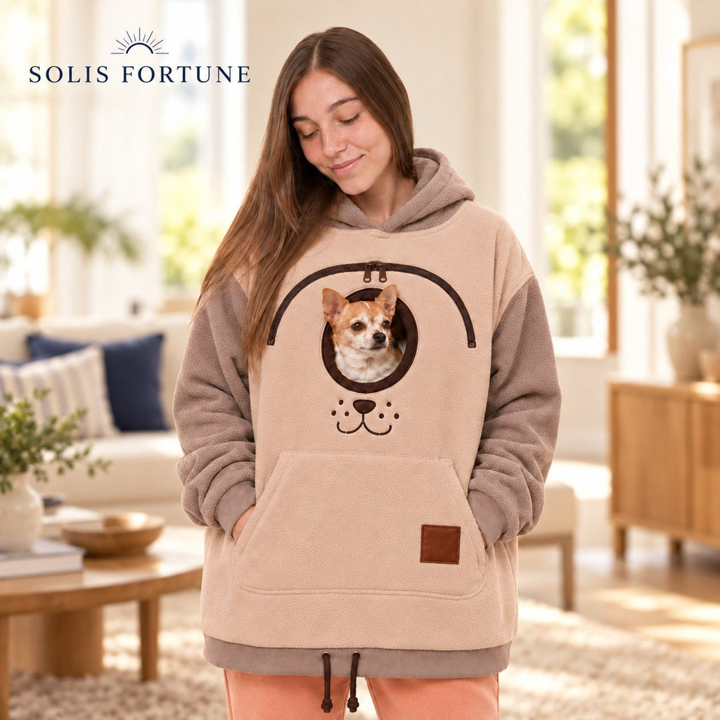 Solis Snuggle Pet Pouch Hoodie in cream with a chihuahua looking out of the chest opening