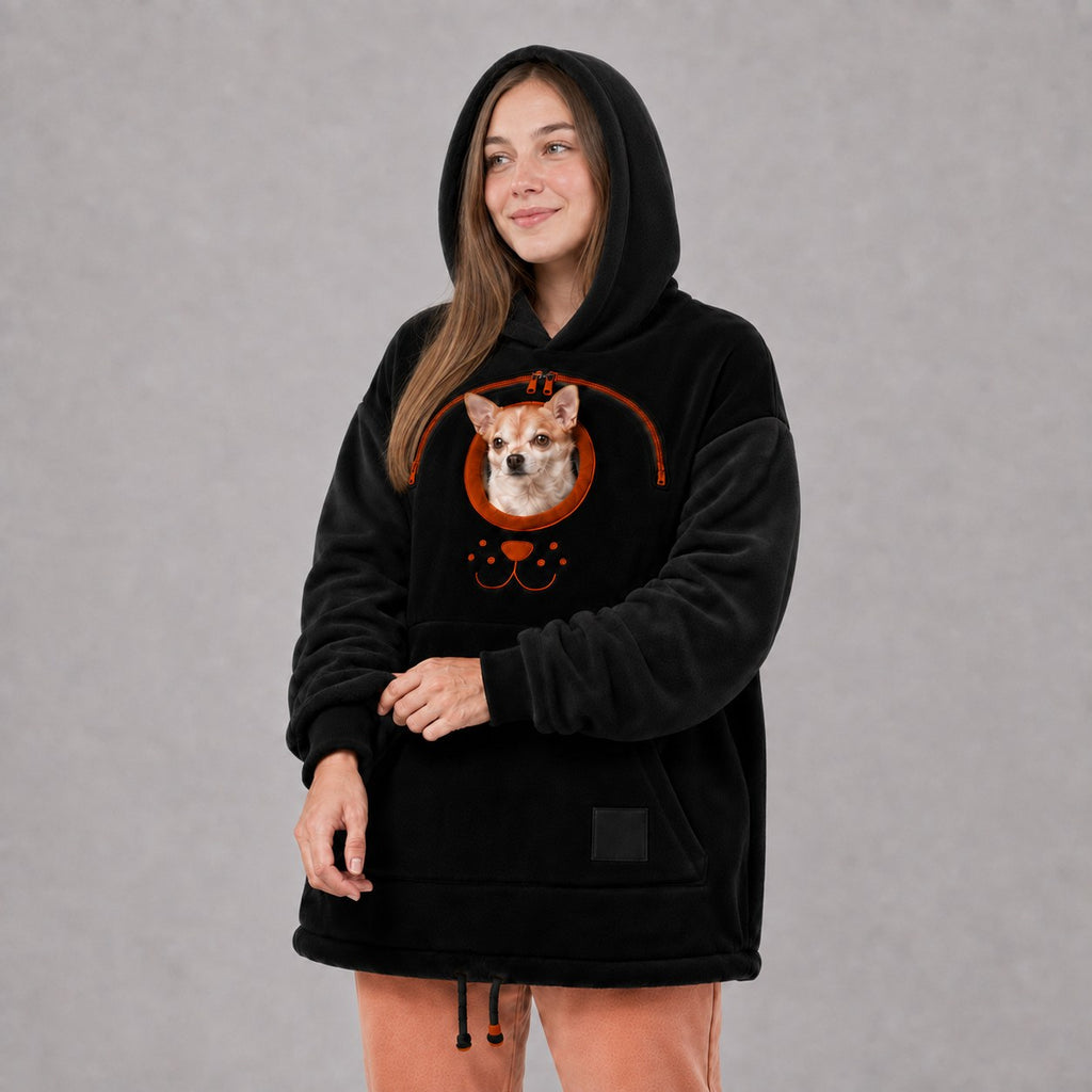 Solis Snuggle Pet Pouch Hoodie in black with a small dog in the pouch