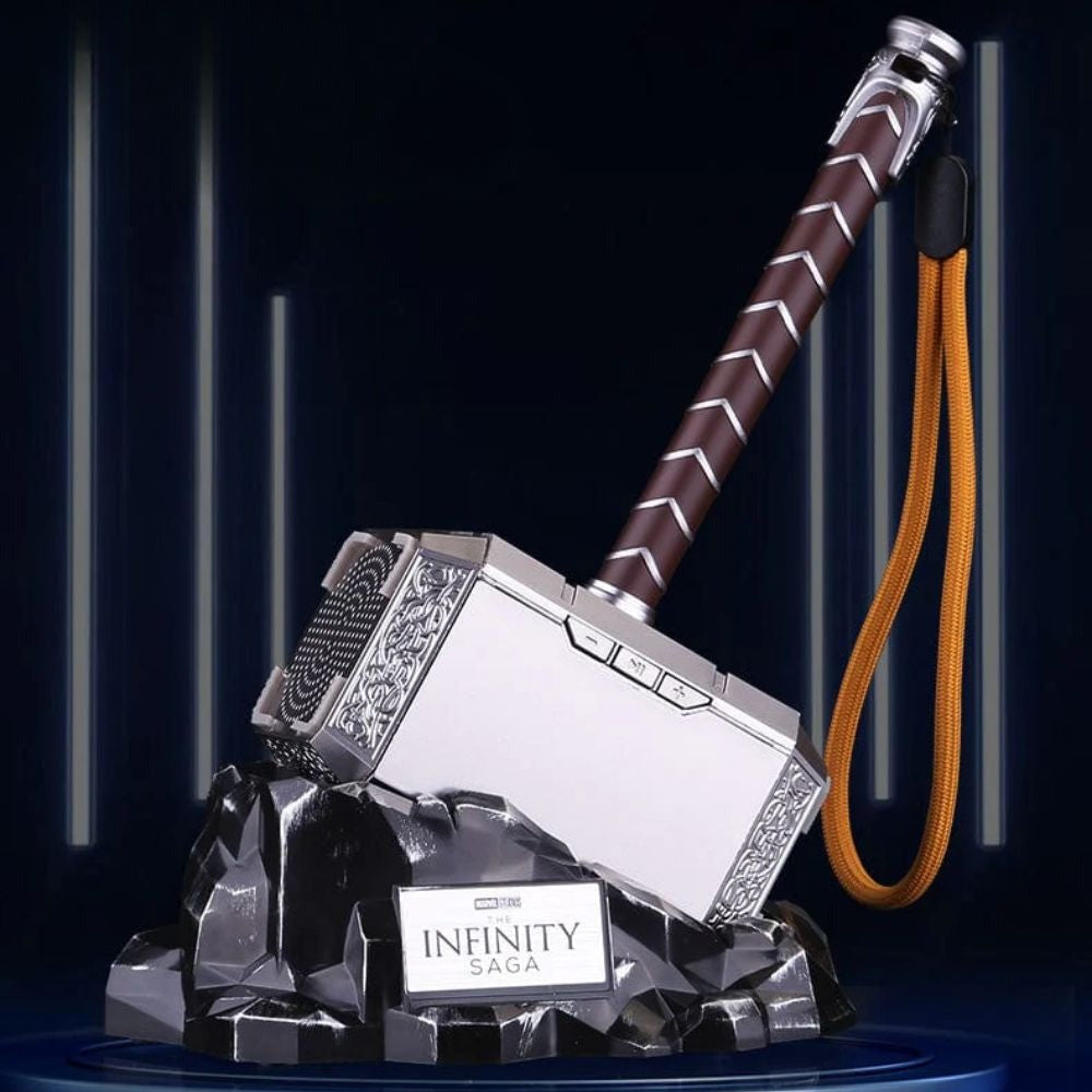 Solis Storm Hammer resting in its rock-effect charging cradle, with the wrist lanyard