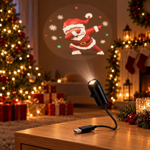 Solis Tinsel — USB Christmas projector light projecting a dabbing Santa on the wall above a fireplace