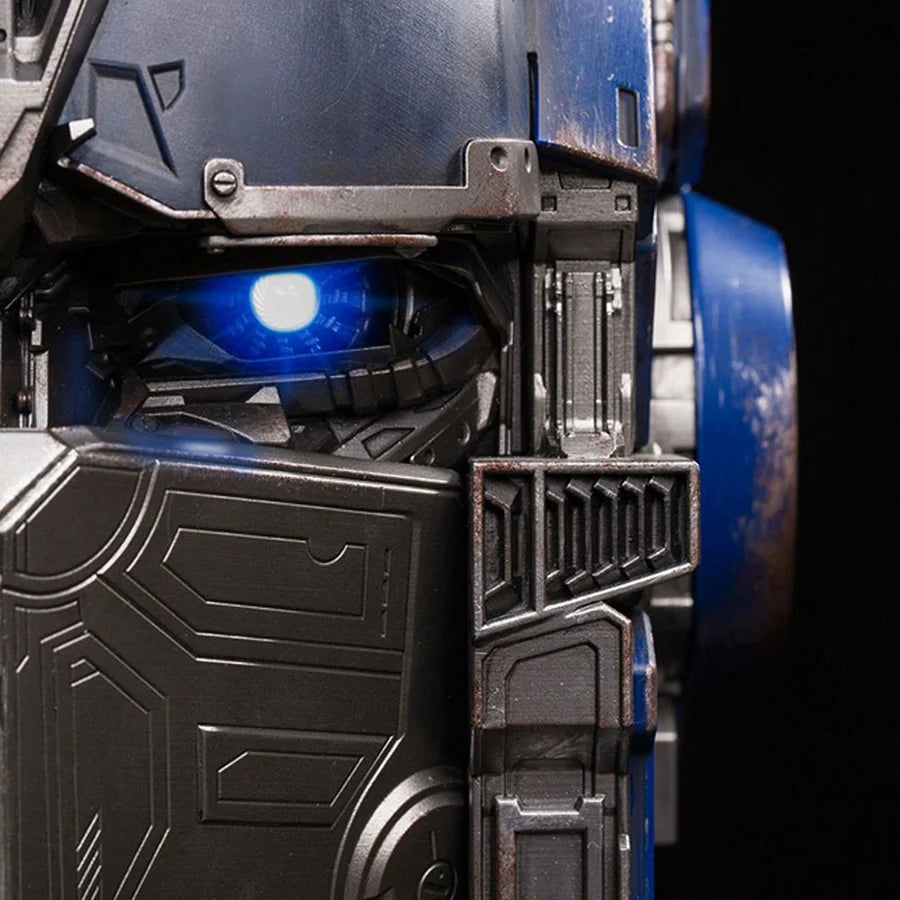 Close-up of a lit eye and the side plating of the Solis Titan Prime helmet