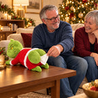 Solis — Grinch butt tissue holder in a red Santa suit on a coffee table, a man pulling a tissue from its backside