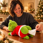 Solis — Grinch tissue box cover lying on a kitchen table with a tissue pulled out of its Santa suit