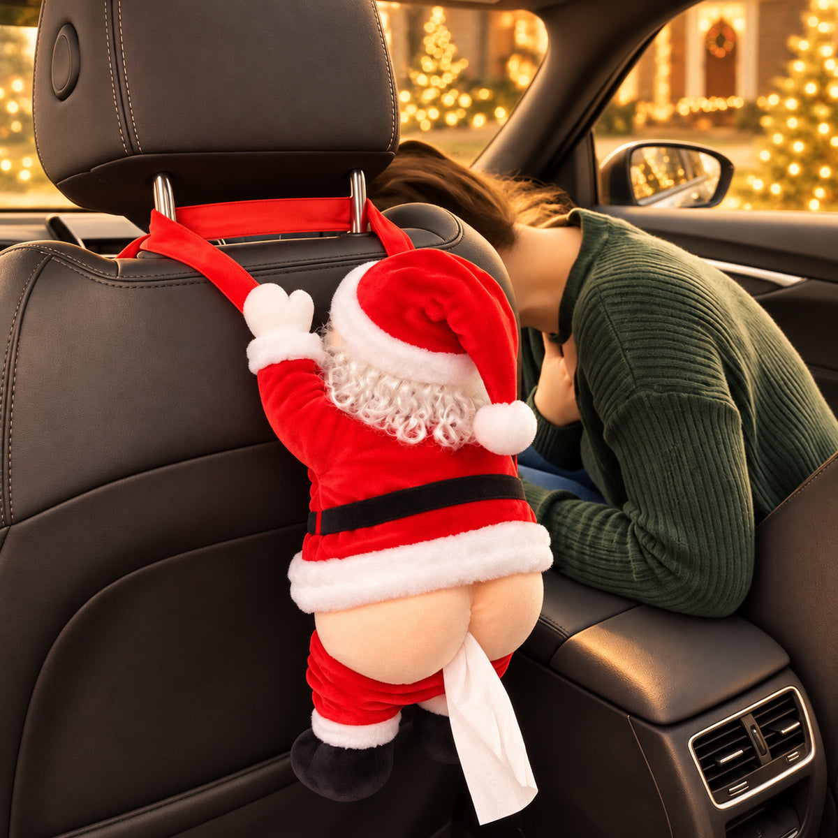 Solis — white-haired Santa butt tissue holder hanging from a car headrest with a tissue between its cheeks