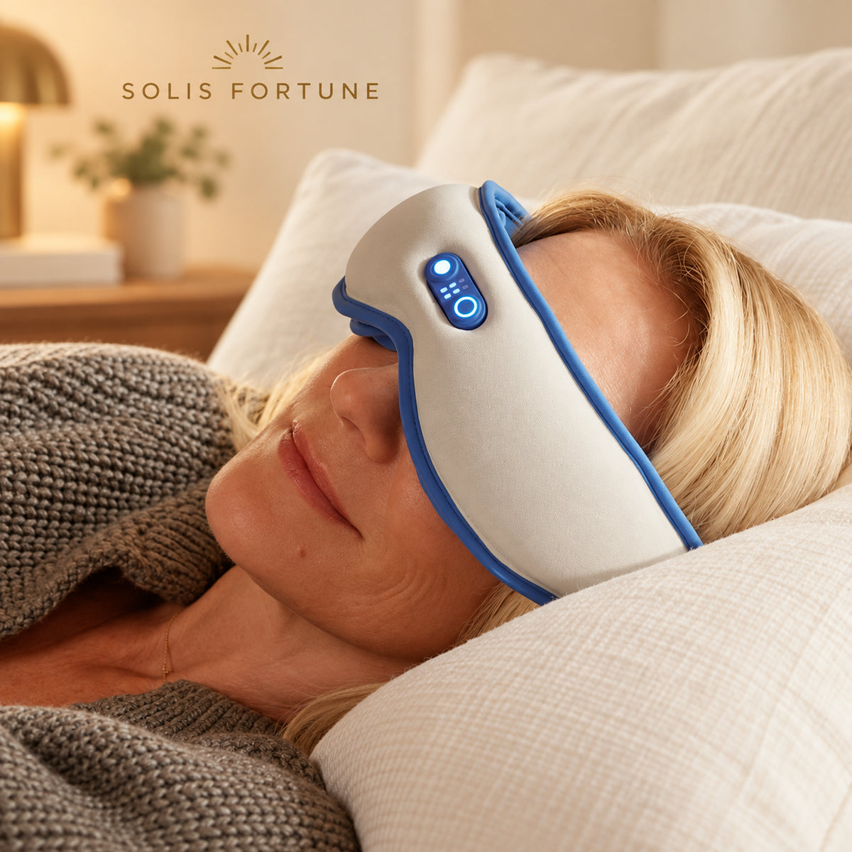 Solis Warmrest — lying back on a pillow wearing the warm eye mask