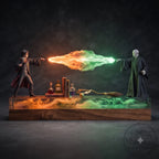 Harry Potter vs Voldemort wand duel LED display by Solis Duel, orange and green spell beam on dark background