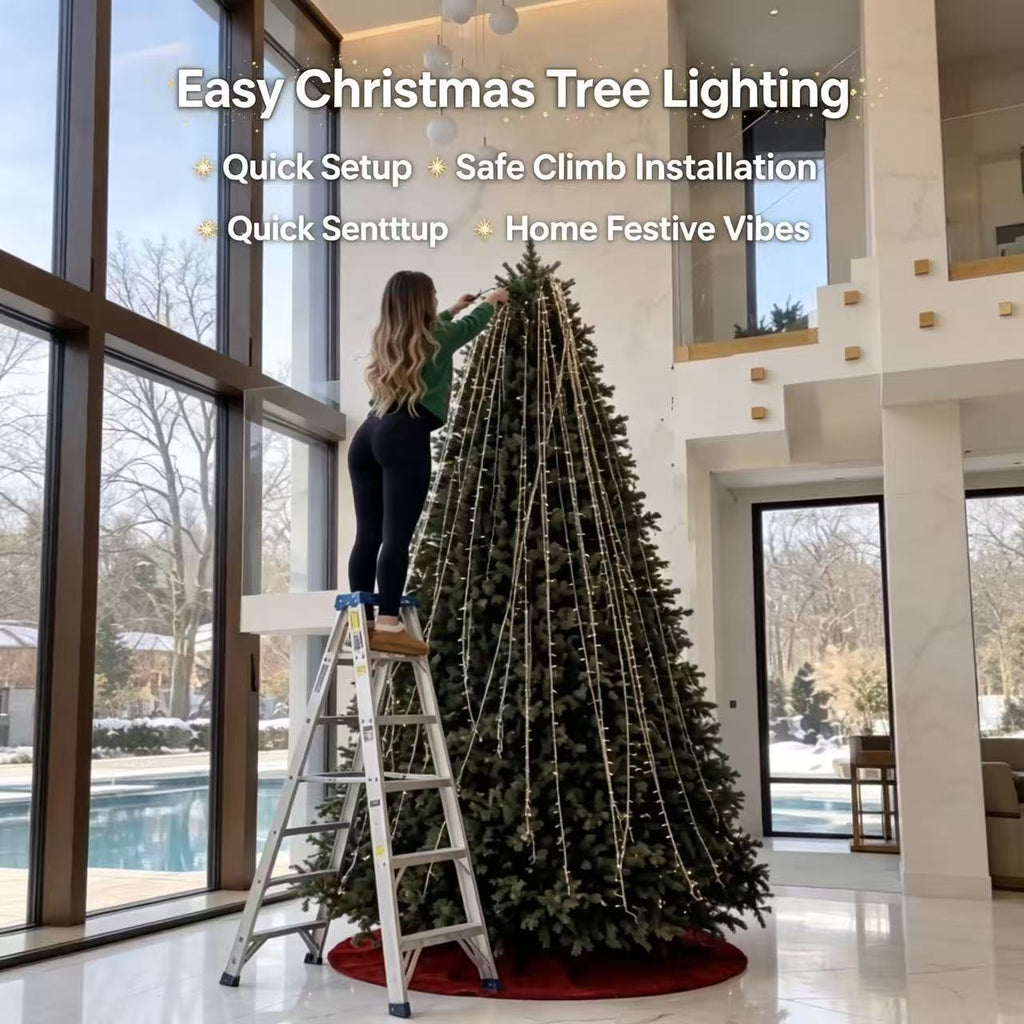 Solis Yuletide — hanging the LED strands from the top of a tall tree