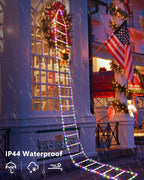 Solis Yuletide Santa Ladder Lights on a snowy porch column, outdoor-rated