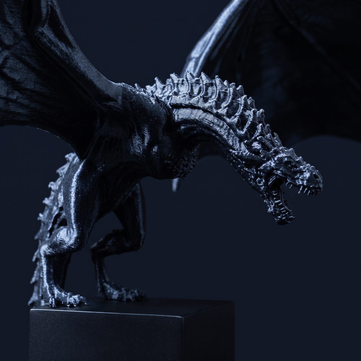 Close detail of the Solis Draco's scaled back, wing membrane and open jaws